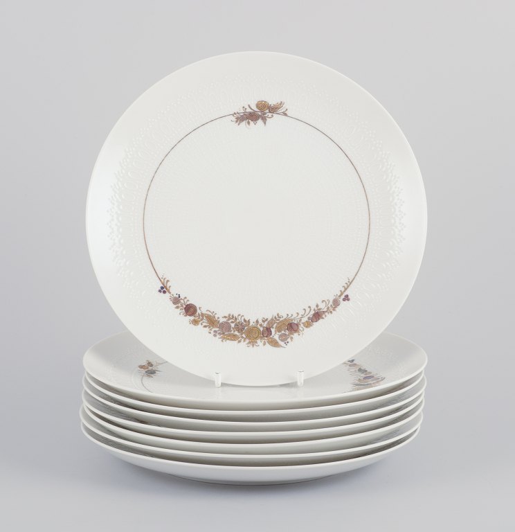 Bjørn Wiinblad for Rosenthal Studioline 362. 
Et sæt på otte ”Romanze” frokosttallerkener i porcelæn.