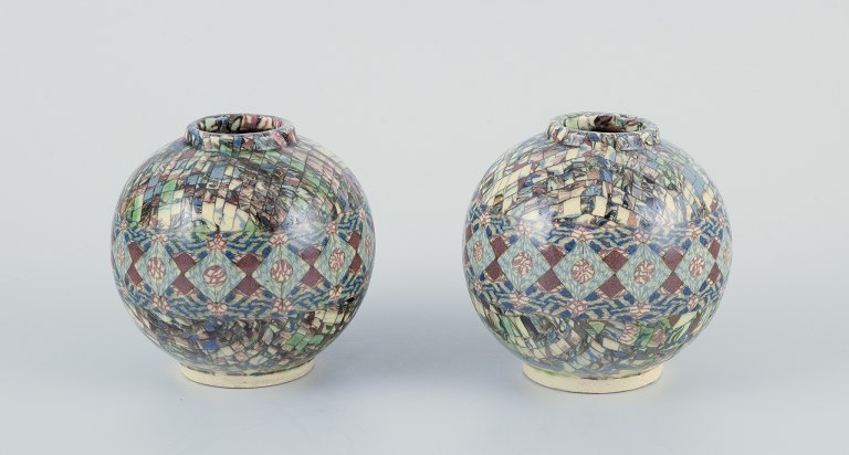 Jean Gerbino for Vallauris, French ceramicist.A pair of small round stoneware vases.