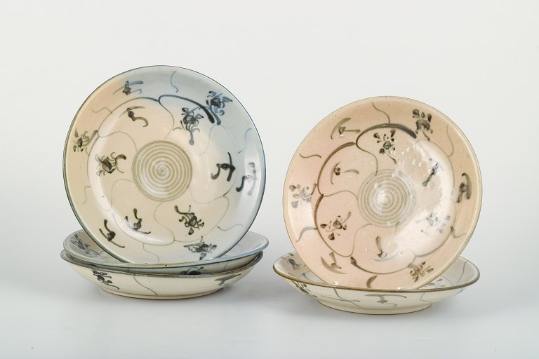 Five Korean bowls, underglaze decorated.