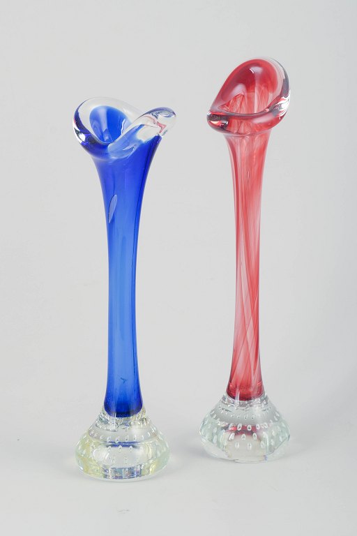 Swedish glass artistTwo vases in colored and clear glass.