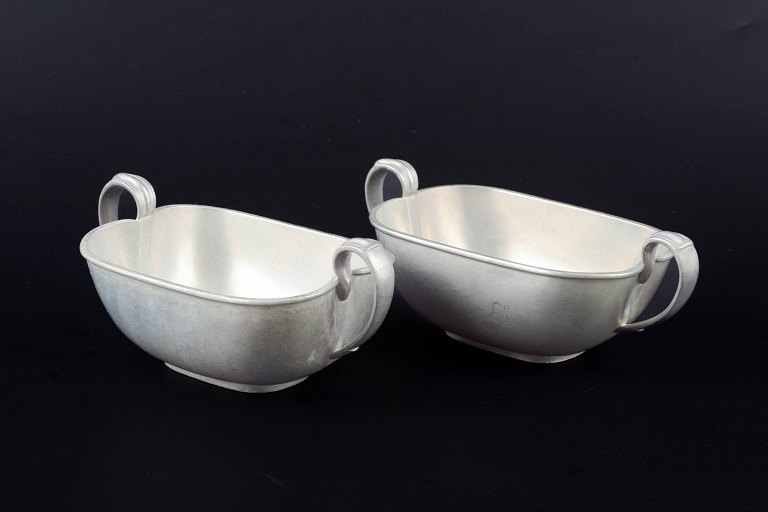 Just Andersen (1884–1943)A pair of pewter bowls with double handles.