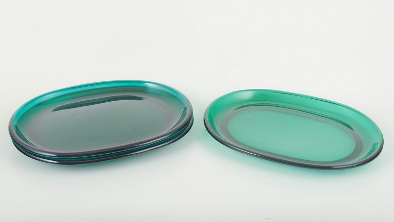 Josef Frank for Svenskt TennThree oval lobster plates in emerald green glass.
