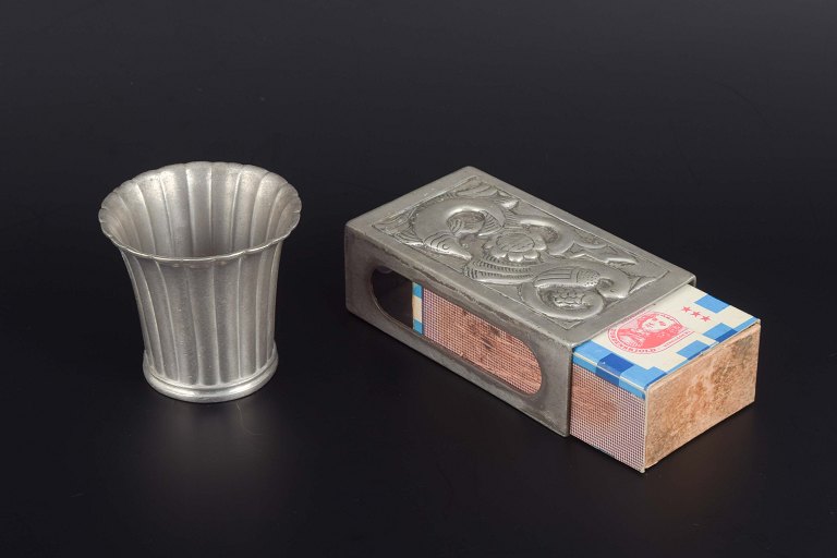 Just Andersen
Vase model 2352 and matchbox holder in pewter, 1930s–40s.