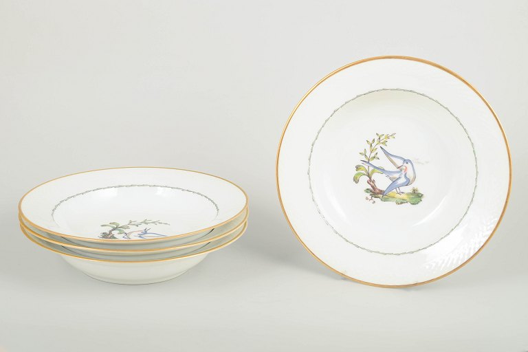 Royal Copenhagen – Set of four large deep plates, early 20th century.
