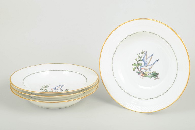 Royal Copenhagen – Set of four large deep plates, early 20th century.