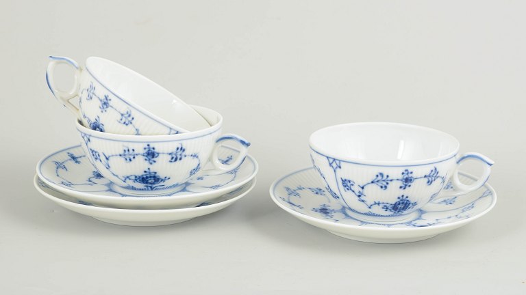 Royal Copenhagen Blue Fluted Plain set of three tea cups with matching saucers.