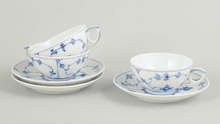Royal Copenhagen Blue Fluted Plain set of three tea cups with matching saucers.