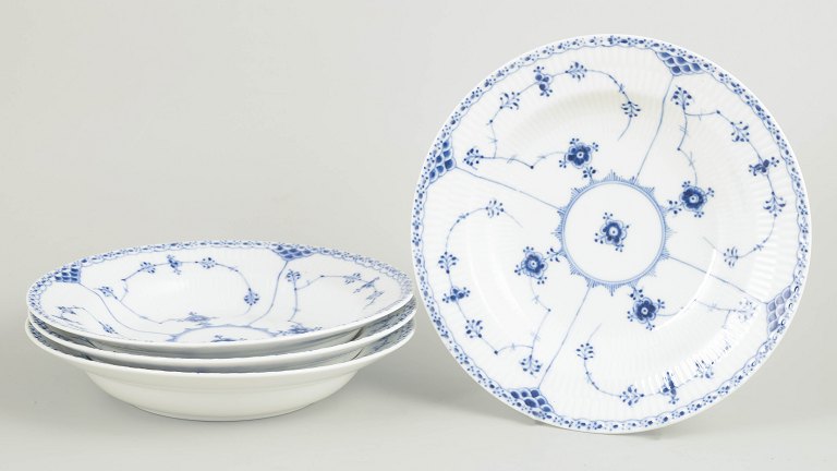 Royal Copenhagen Blue Fluted Half Lace set of four soup plates.