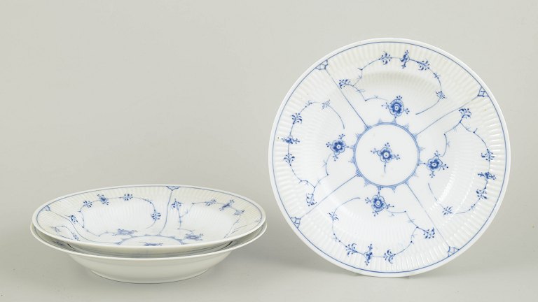 Royal Copenhagen Blue Fluted Plain soup plates, set of three.
