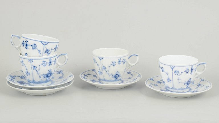 Royal Copenhagen Blue Fluted Plain, set of four coffee cups with saucers.