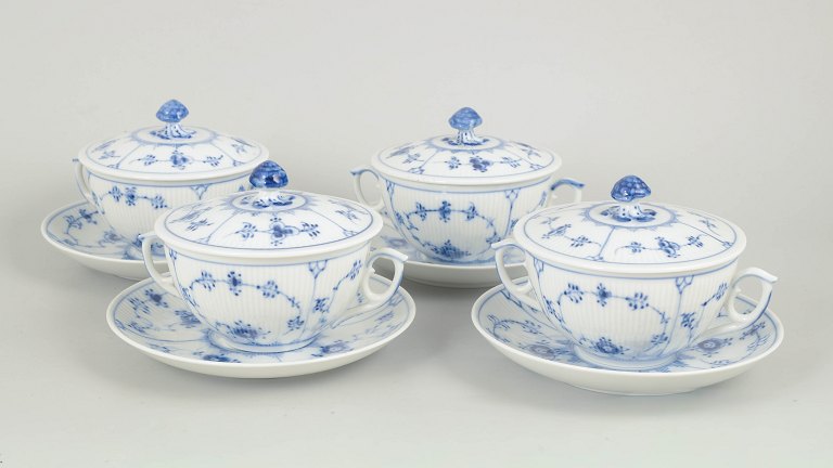 Royal Copenhagen, Blue Fluted Plain set of four bouillon cups with saucers.