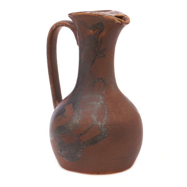 Mogens Andersen for Royal Copenhagen stoneware pitcher. Signed. H: 25cm
